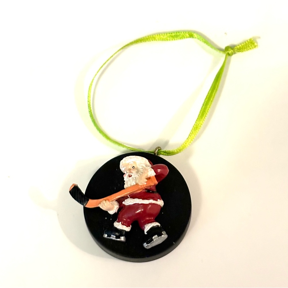 Santa Hockey Ornament with Green Ribbon